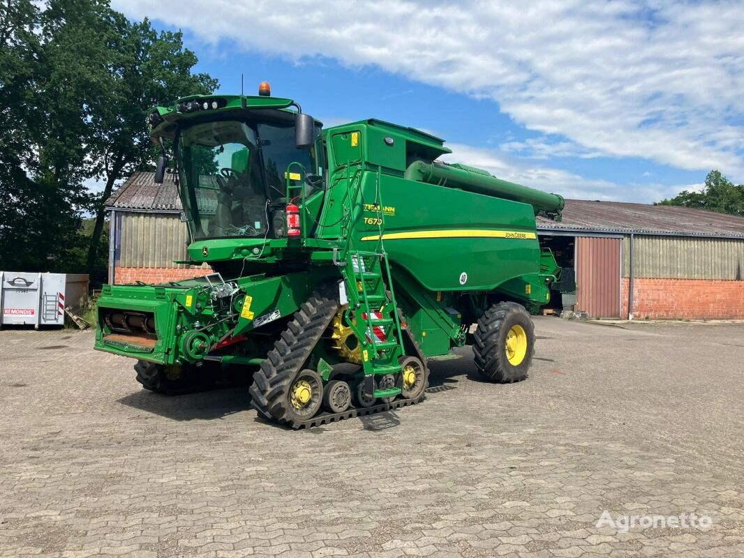 new John Deere T670 grain harvester